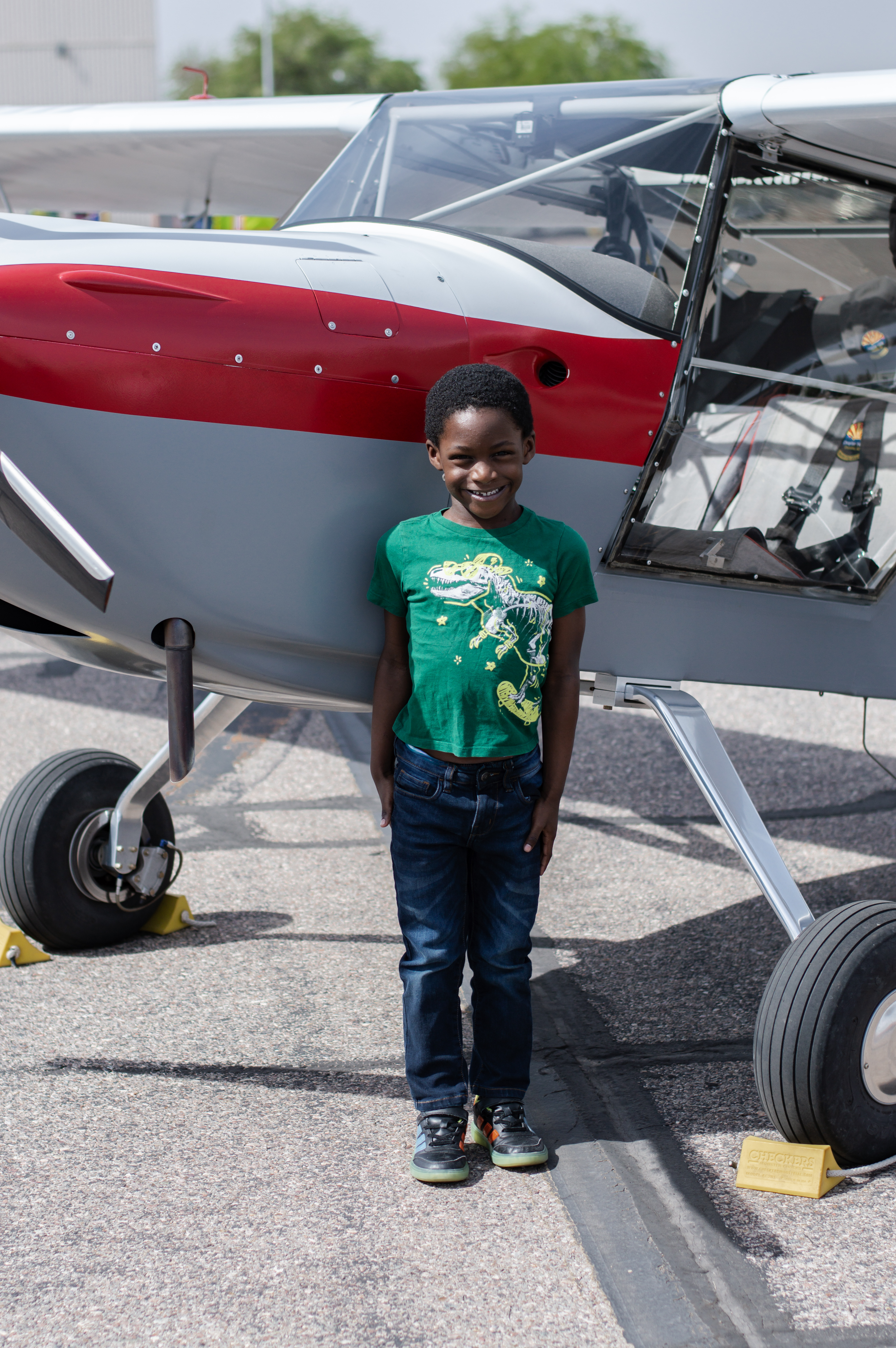 Messiah standing in front of the nose of the plane
