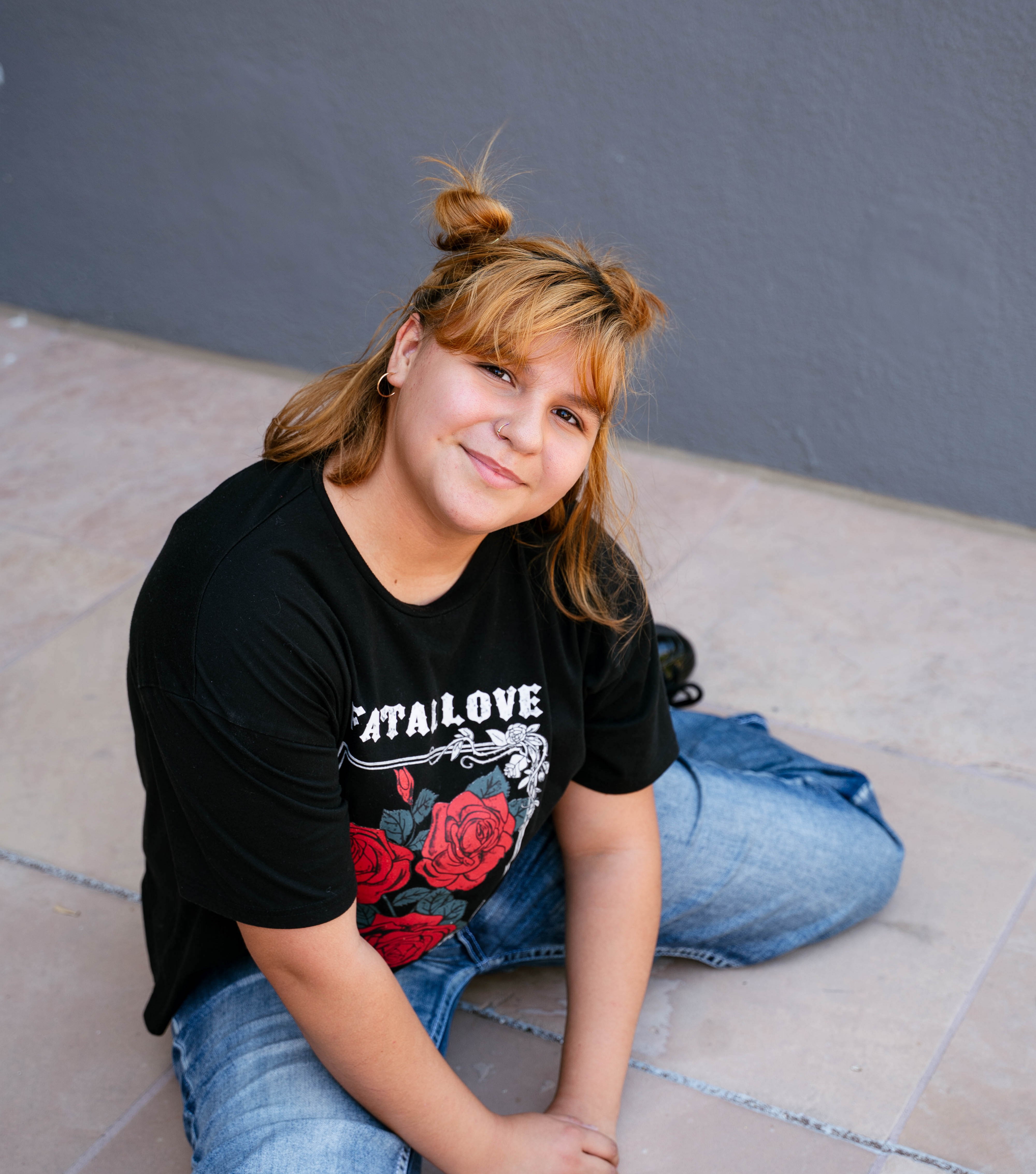 Valeria sitting on ground