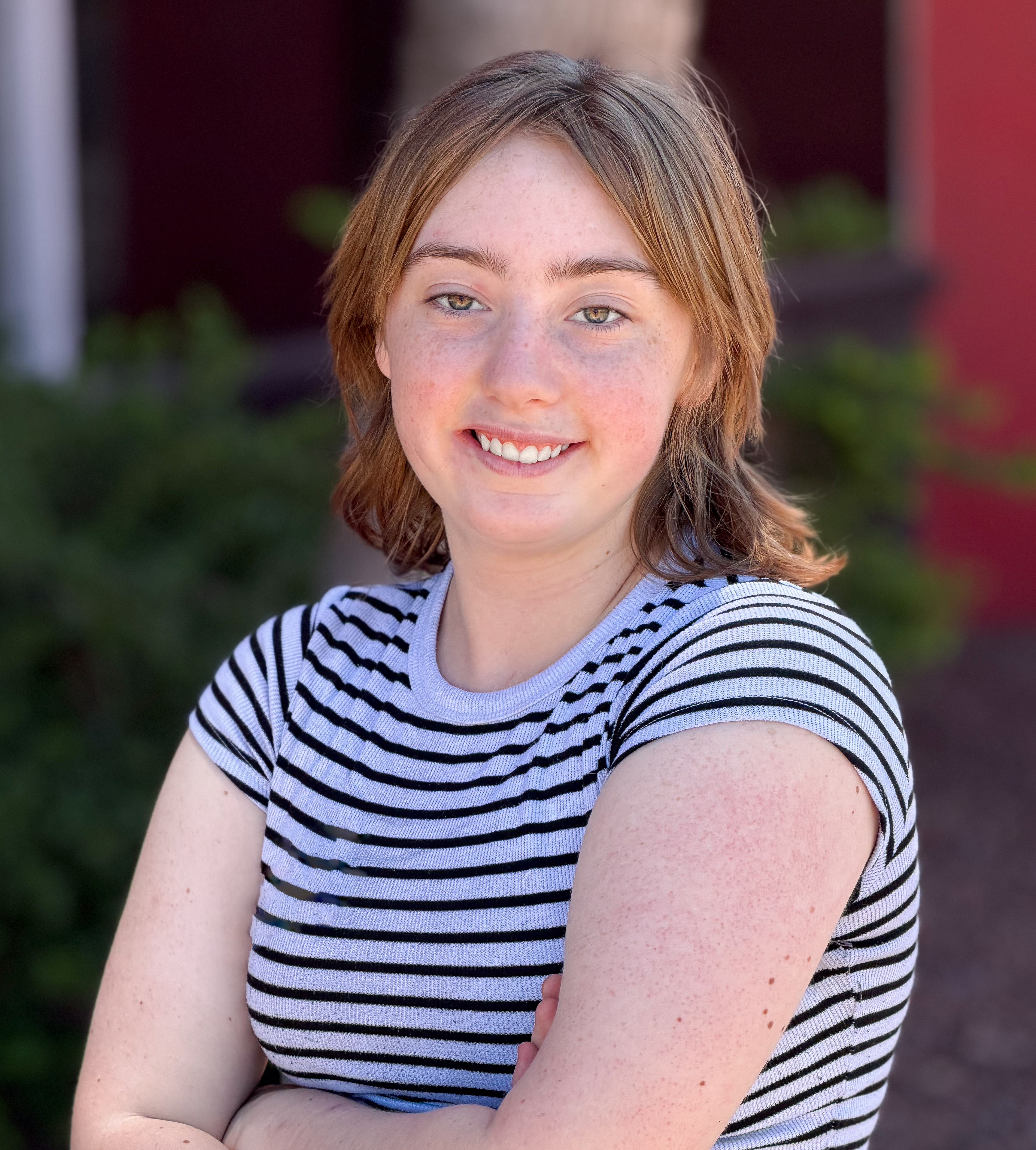 Kari standing with arms crossed