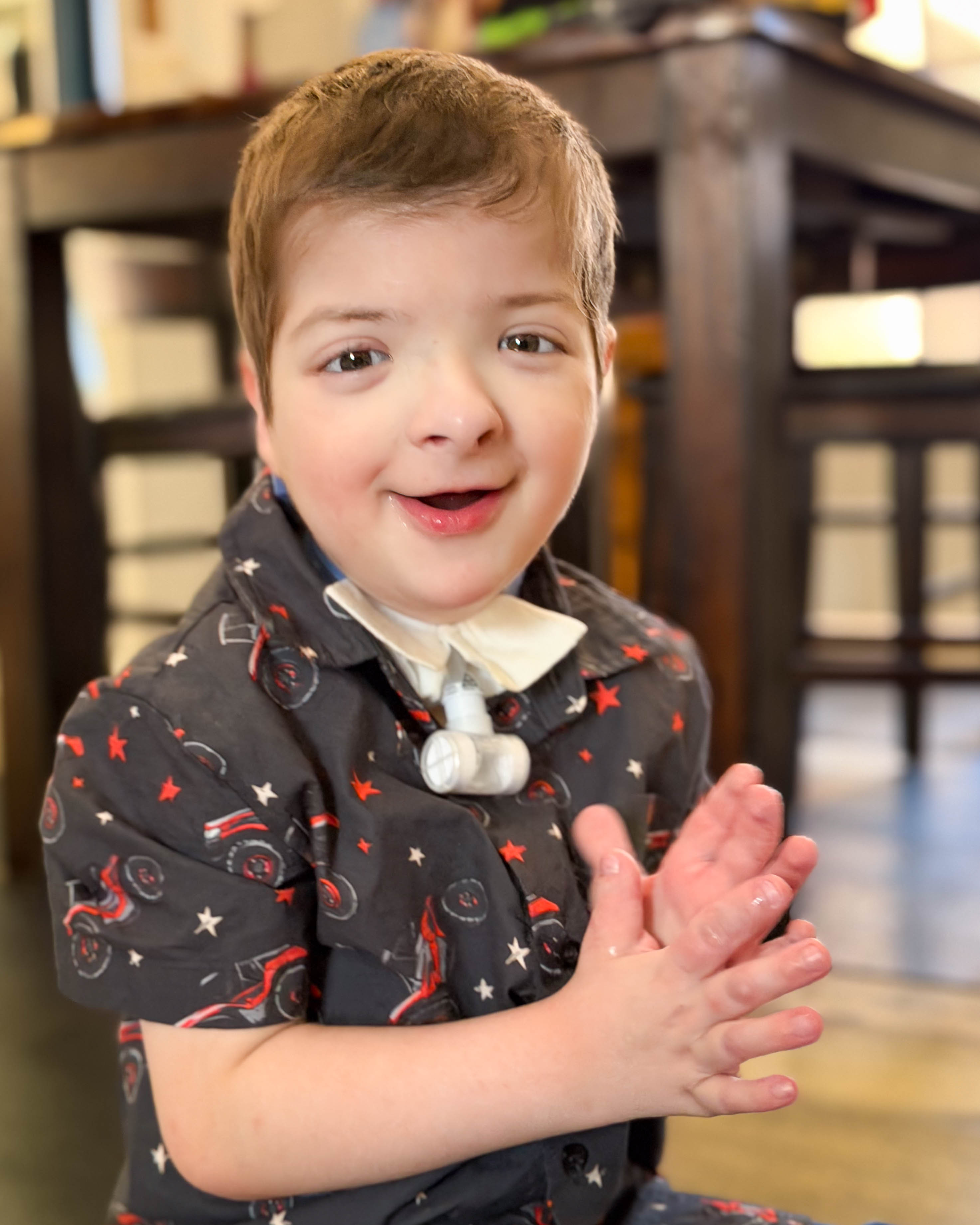 Kayson smiling clapping